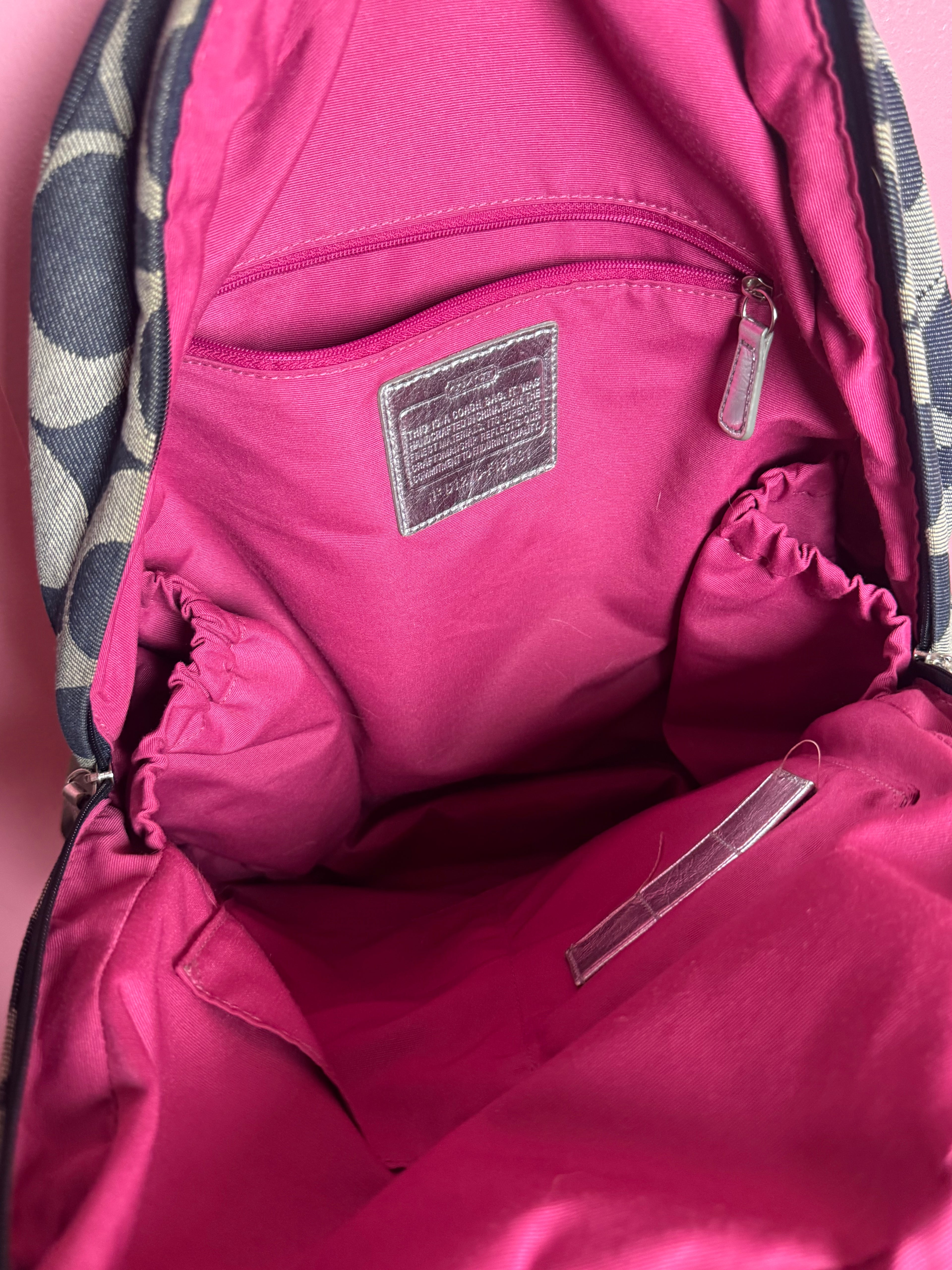 2000’s silver and denim Coach backpack