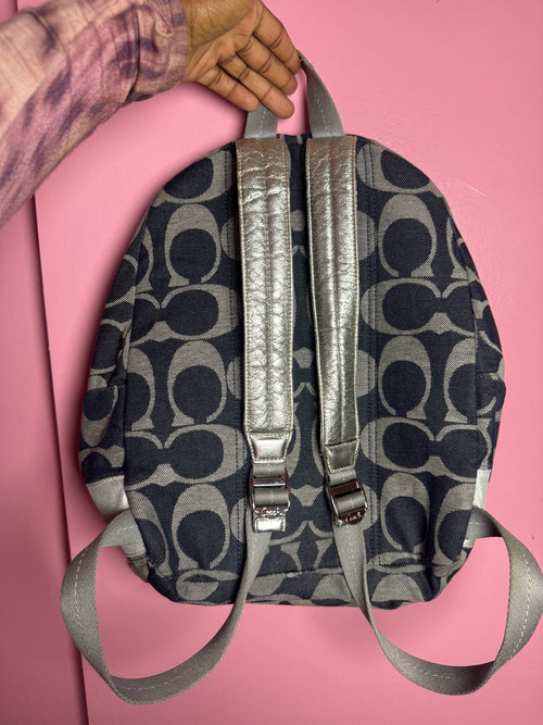 2000’s silver and denim Coach backpack